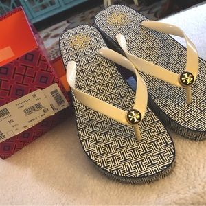 Tory Burch wedge flip flops size 10,navy and cream. Only worn a few times.